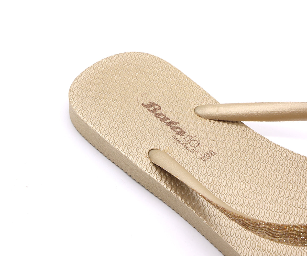br glittery gold flip flops