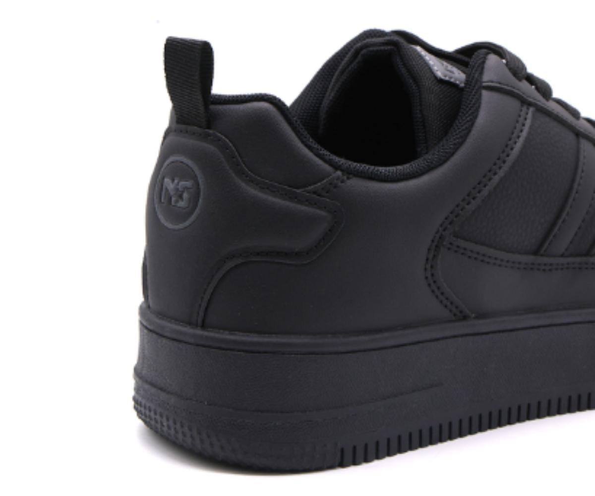 all black low-top sneakers