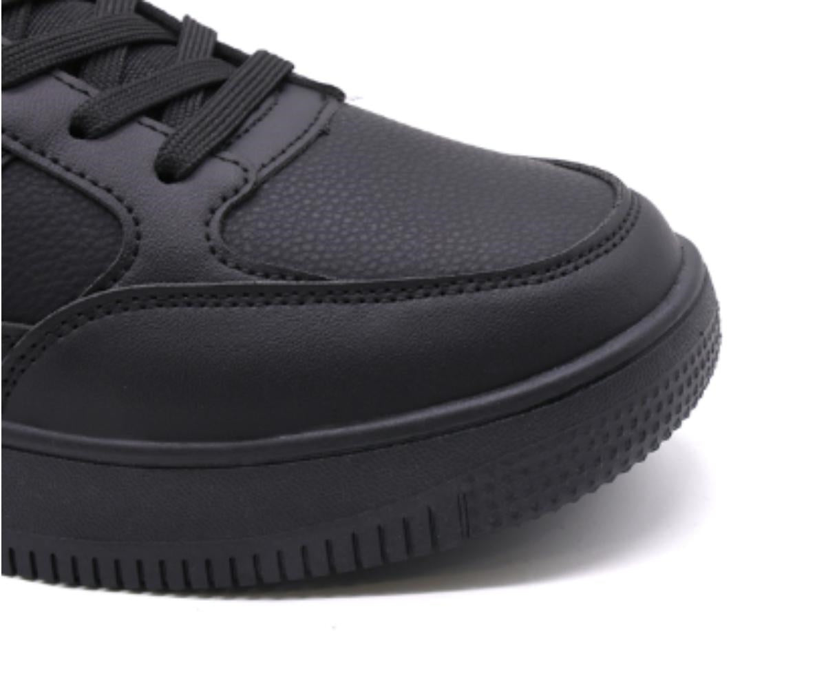 all black low-top sneakers