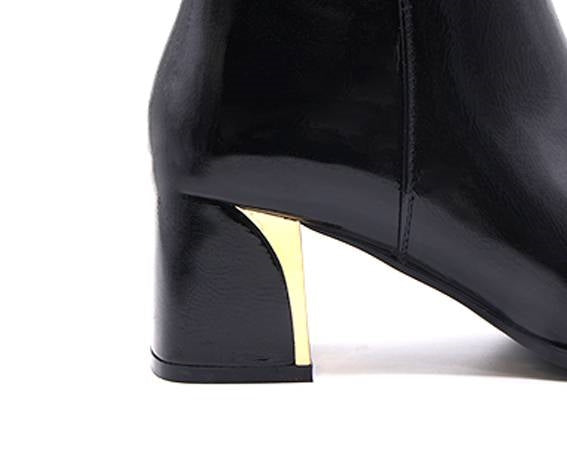 black patent gold-heel booties