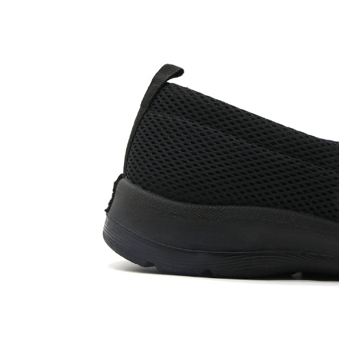 Black Cushion-Step Mesh Slip-On in Black – close-up of the heel and sole