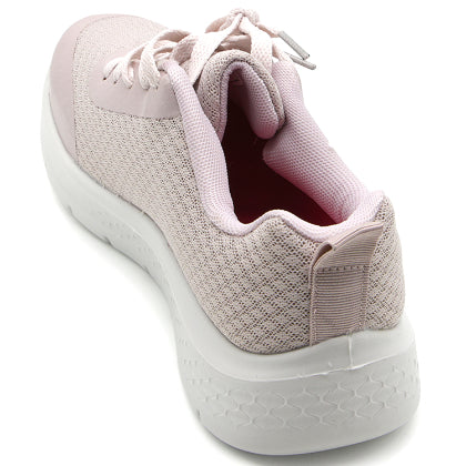 Pink Soft-Knit Sneaker in Pink – angled view from the heel