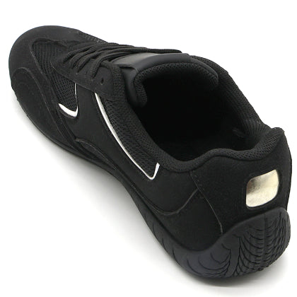 Black Retro Court Sneaker in Black – angled view from the heel