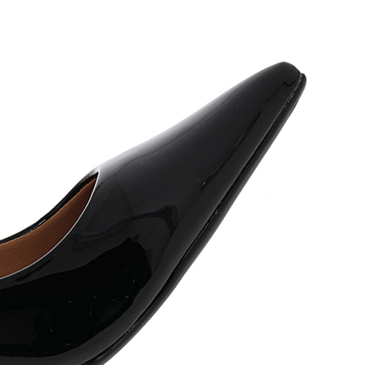 mid-heel patent black pointed-toe pumps