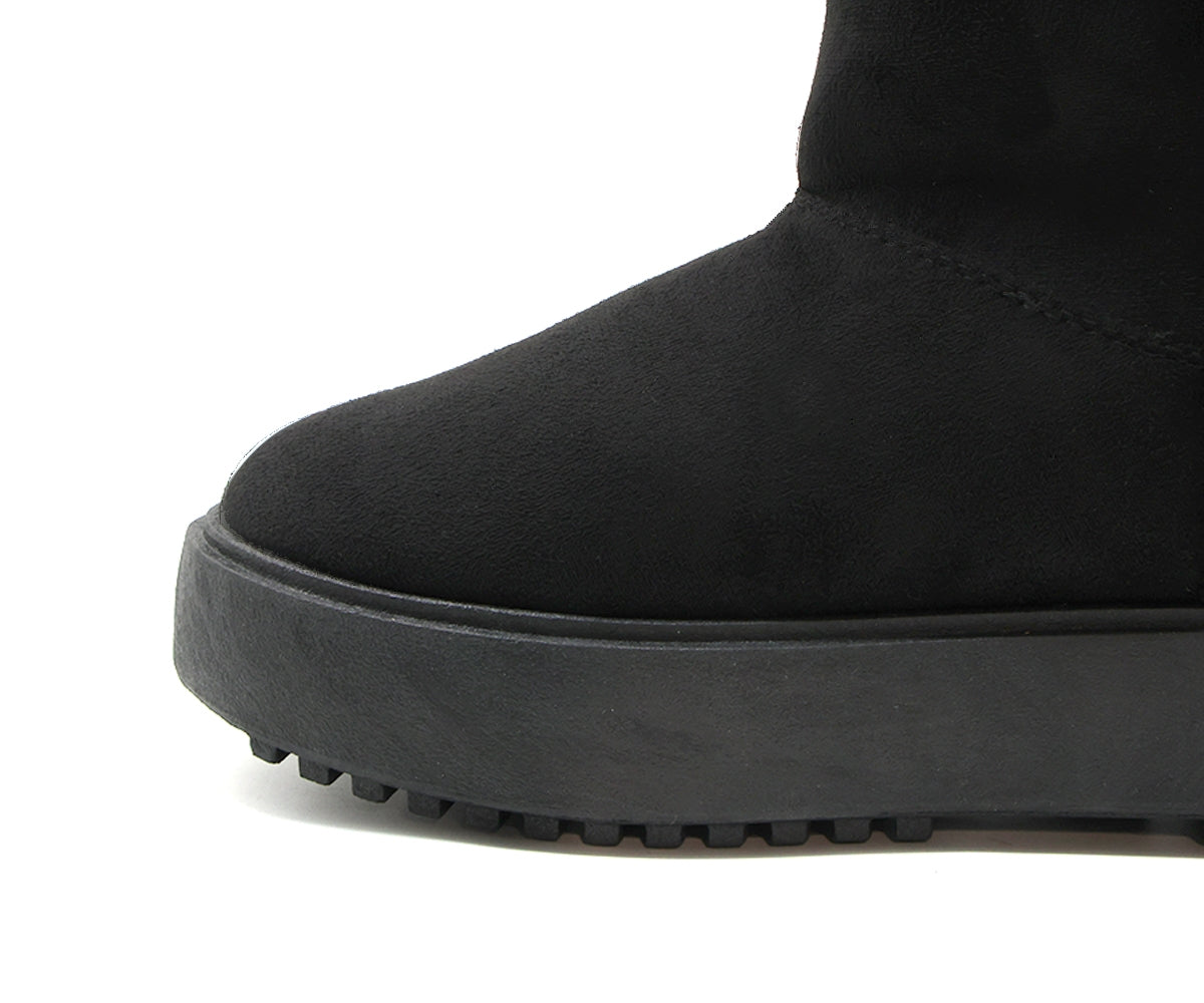 black fur-lined zipper boots