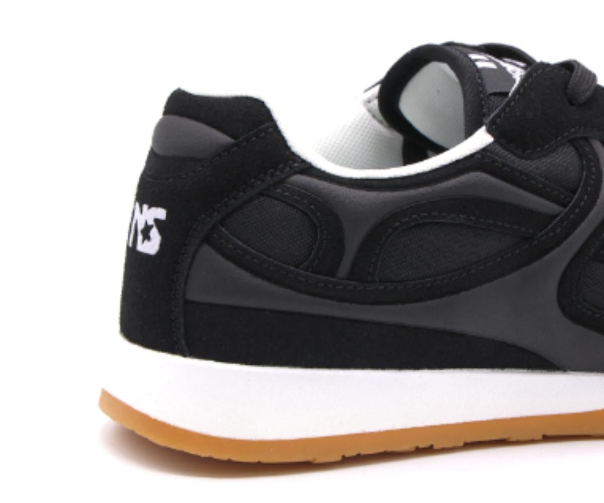 black panelled gum sneakers