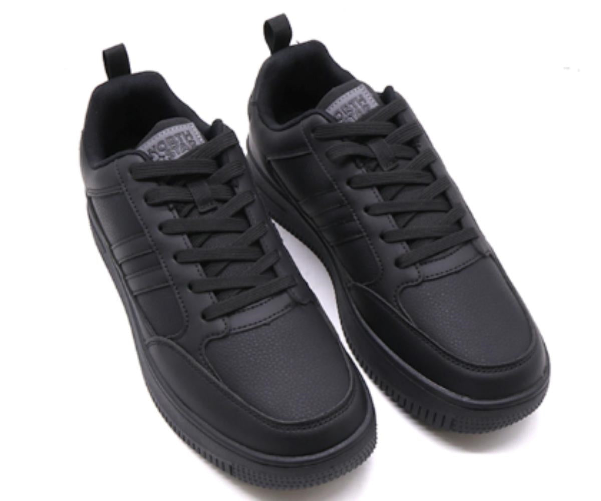 all black low-top sneakers