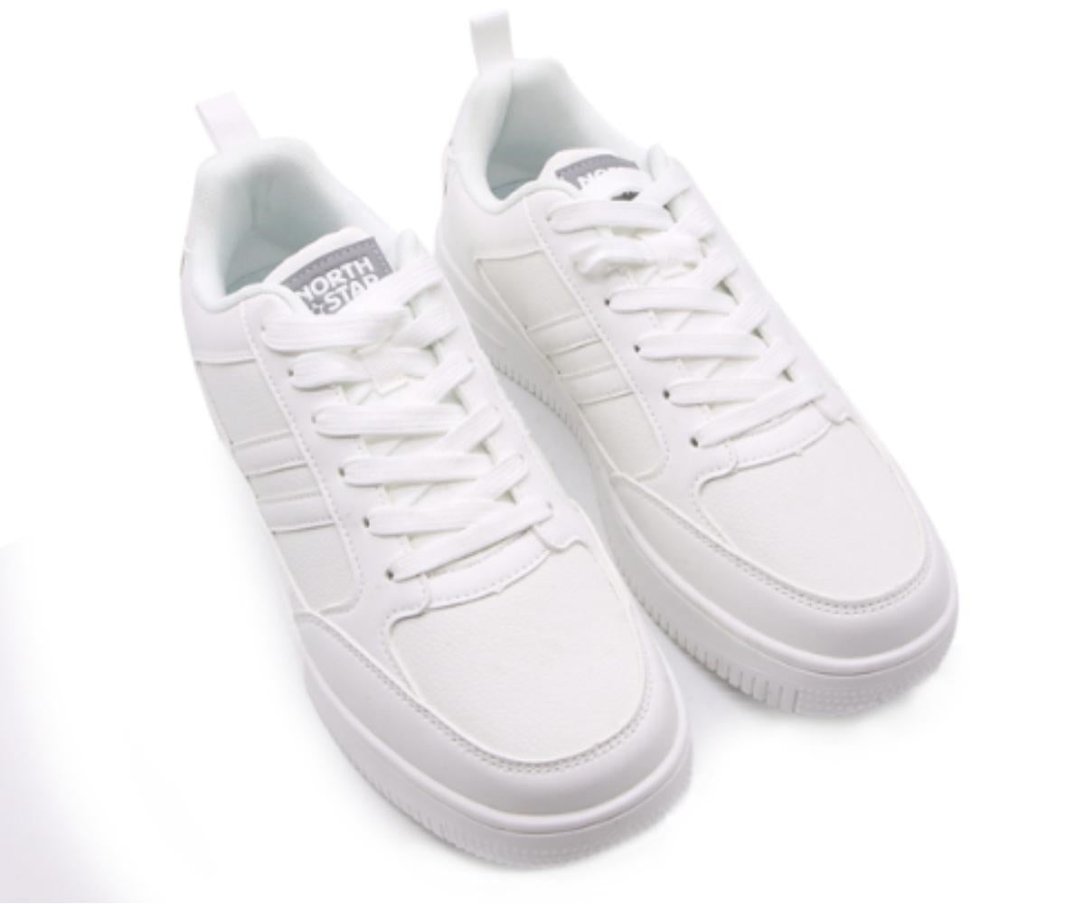 all white low-top sneakers